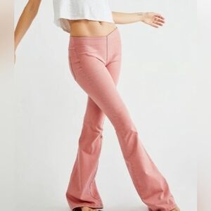 Free People bell bottom jeans in Dusty Rose